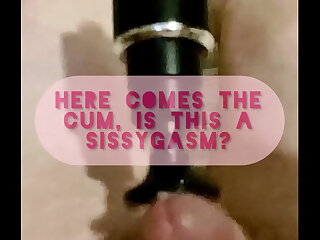 A sissy in a red negligee, eager for anal, faces down, ass up. A steamy story unfolds, igniting precum stains and a sissygasm. A cock sucker and bottom, she craves a kinky shemale encounter.