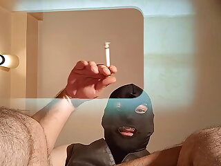 Brace for a wild ride as I spit into an ashtray, then kneel and eagerly lick your balls. This intense BDSM experience is a testament to my unwavering dedication to fetish and humiliation.